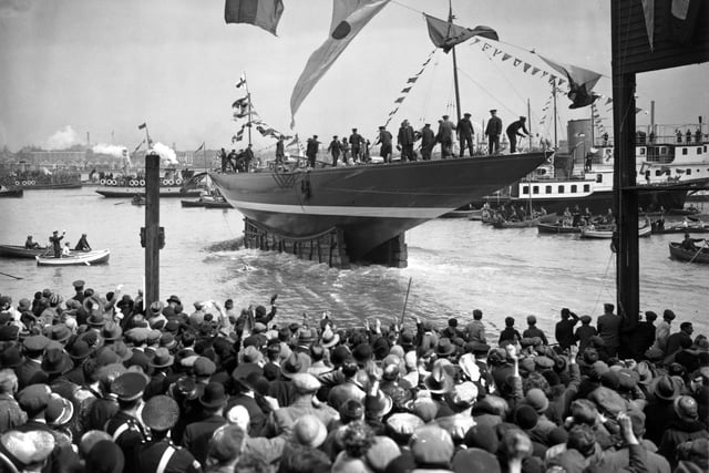 April 1934:  The launch of Tommy Sopwith's all-steel yacht Endeavour, this years challenger for the America's Cup, at Gosport, Hampshire.  (Photo by A. Hudson/Topical Press Agency/Getty Images)