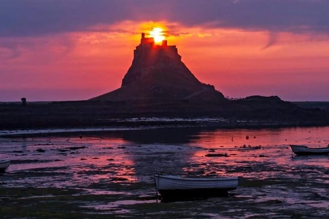 A lovely bit of pink sky surrounds Lindisfarne Castle.