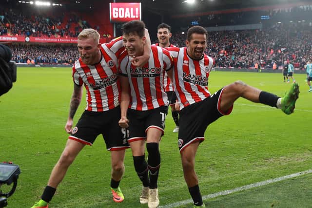 Anel Ahmedhodzic (centre) is loving life with Sheffield United: Simon Bellis / Sportimage