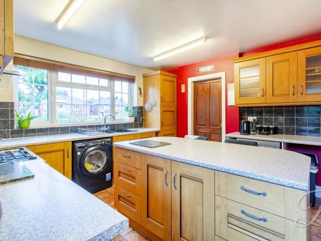 A second shot of the modern kitchen, which is brilliant for breakfasts and also to show off your culinary skills. There is also an inset sink and drainer, cupboard for additional storage, and space and plumbing for a washing machine.