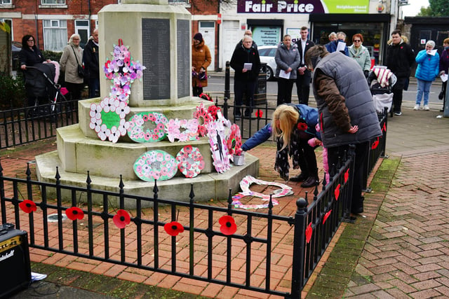 A number of local children attended the ceremony to pay their respects