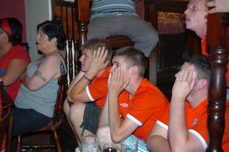 Fans watch in dismay as England bow out of the 2010 World Cup.