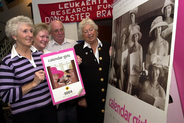 Checking out the Calendar Girls 2004 calendar and a publicity poster before attending the Doncaster Odeon showing of the film are, from left, Pat Bevan, of Askern, Alison Gibson, of Wheatley Hills, Askern  Town Councillor Martin Bevan and Audrey Gibson, of Wheatley Hills.