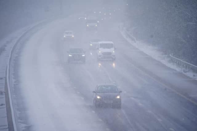 File photo, Ben Birchall/PA Wire. National Highways has asked motorists to reconsider their journeys in the face of an amber weather warning for snow across the Midlands and the North of England.