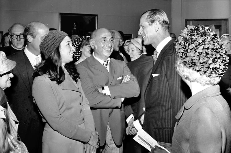 Prince Philip Duke of Edinburgh chats to painter Alberto Morrocco  during the Royal Family's visit to the Royal Scottish Academy in July 1971.