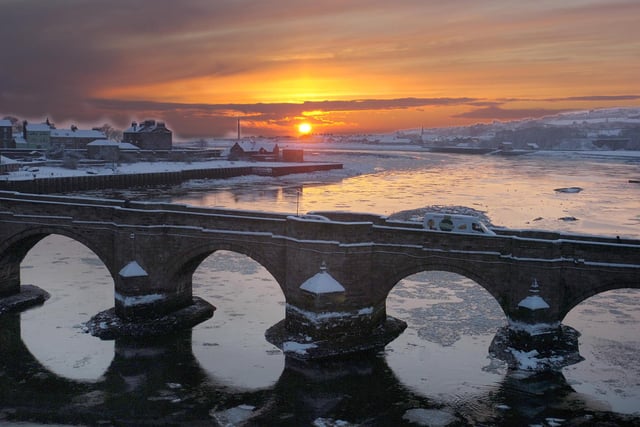 Sunrise over Berwick with ice on the River Tweed.