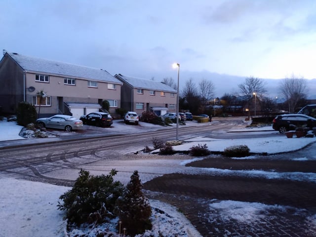 Driveways needed clearing and windscreens needed scraping in snowy Baberton, in the south west of the Capital.