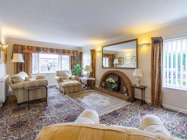 Comfort is the word that springs to mind when you walk into the property's living room. It boasts a feature fireplace, carpeted floor, central-heating radiator and windows to the front and side of the bungalow.