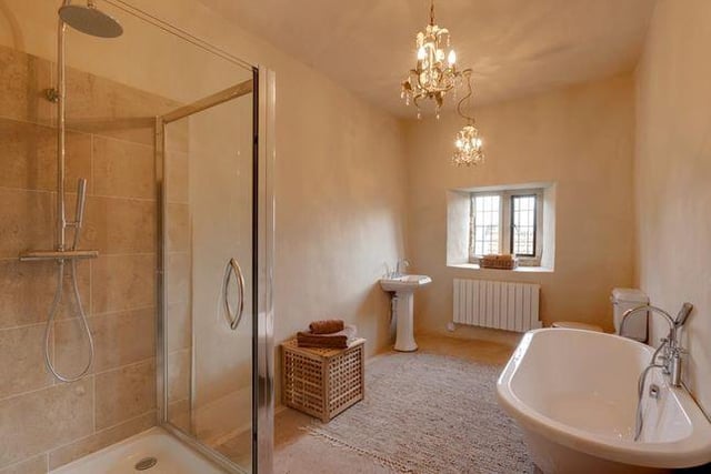 This room has a free standing bath and original lime-ash floor.