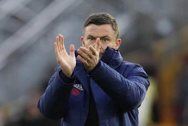 Paul Heckingbottom applauds Sheffield United's supporters after their FA Cup defeat at Wolves: Andrew Yates / Sportimage