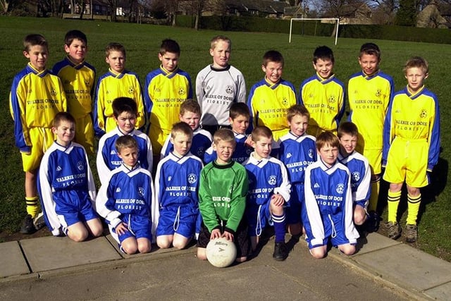 Dore Primary School under 10 and 11's football teams show off their new kit, February 2002