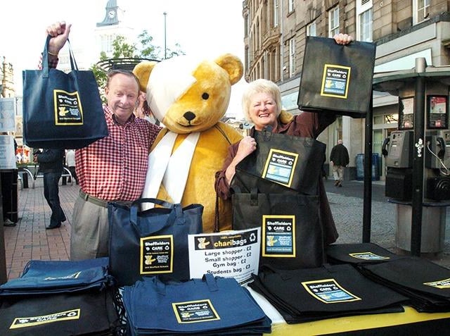 Lottery winners Ray and Barbara Wragg on Fargate selling Chari Bags for the Sheffield Children's Hospital, on May 1, 2007