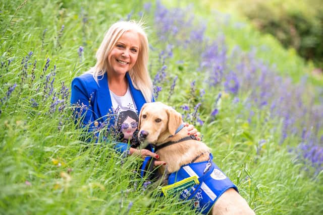 Lotto winner Deana Sampson trains Regis, a 6 month old Labrador for Support Dogs Sheffield in Mosborough, UK . Picture date: Tuesday May 19, 2020. Photo credit should read: Anthony Devlin