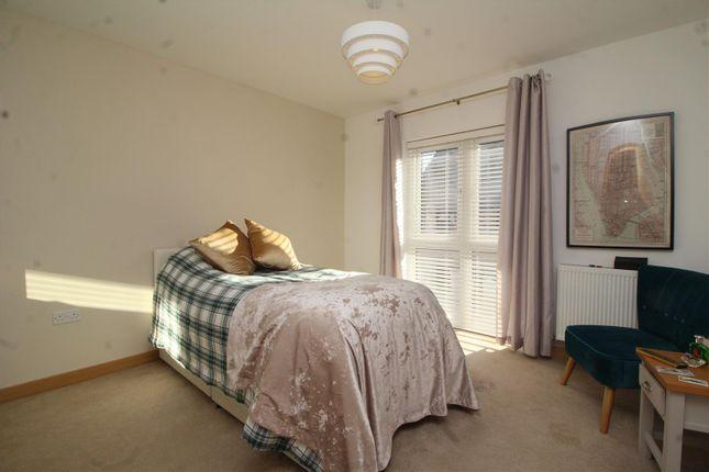 Bedroom Three is 3.45m x 3.43m, with a radiator and large window, allowing lots of light