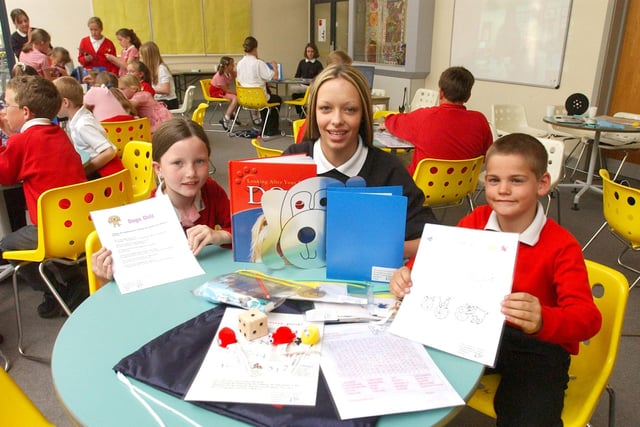 Feeder school pupils were enjoying making story bags with the help of pupils from Easington Community School in 2004.
