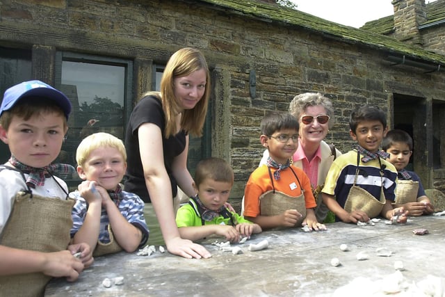 The Lord Mayor Coun  Marjorie Barker and children from Owler Brook school learn  toy making at the launch of the summer fun programme at Abbedyale Hamlet  in 2002