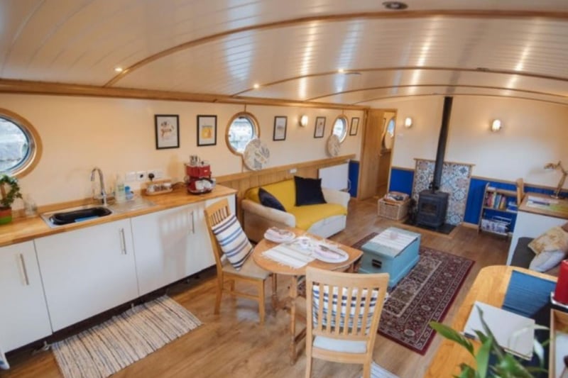 Inside, the barge boasts wooden floors and contemporary furnishings.