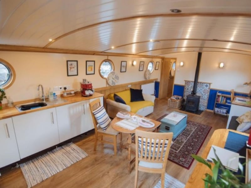 Inside, the barge boasts wooden floors and contemporary furnishings.