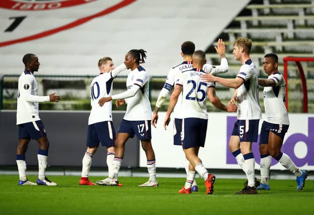 ANTWERPEN, BELGIUM - FEBRUARY 18: Joe Aribo of Rangers celebrates after scoring their sides first goal with Steven Davis of Rangers during the UEFA Europa League Round of 32 match between Royal Antwerp FC and Rangers FC at Bosuilstadion on February 18, 2021 in Antwerpen, Belgium. Sporting stadiums around Belgium remain under strict restrictions due to the Coronavirus Pandemic as Government social distancing laws prohibit fans inside venues resulting in games being played behind closed doors. (Photo by Dean Mouhtaropoulos/Getty Images)
