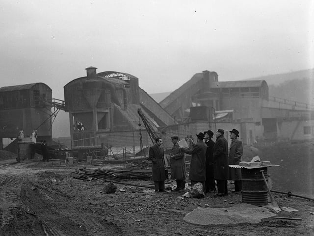 Commissioner Mr G Shewan being shown around Blackford Hill Quarry by County Road Surveyor Mr G Issac in January 1953.