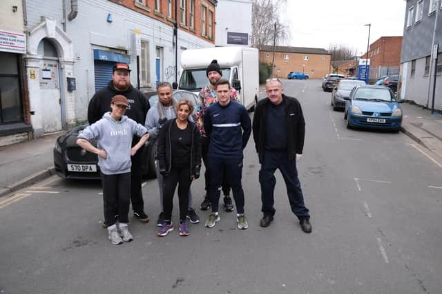 Sarah Kettle, left, and other business owners on Harwood Street say SUFC coaches block access for customers.