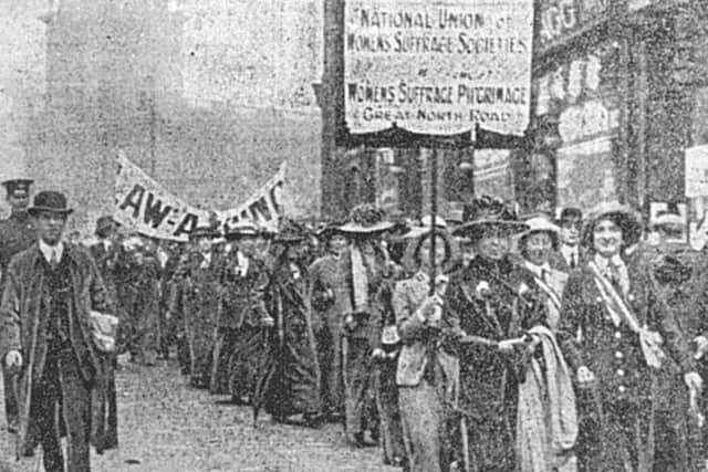 Sheffield Daily Independent picture of suffragette pilgrims on Pinstone Street, 1913.