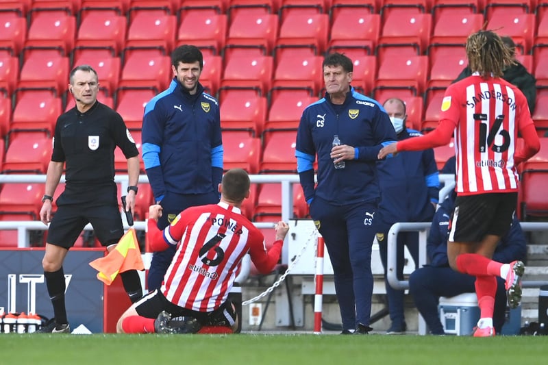 Sunderland player Max Power celebrates in front of  Craig Short and the Oxford bench after scoring the third Sunderland goal during the Sky Bet League One match between Sunderland and Oxford United.