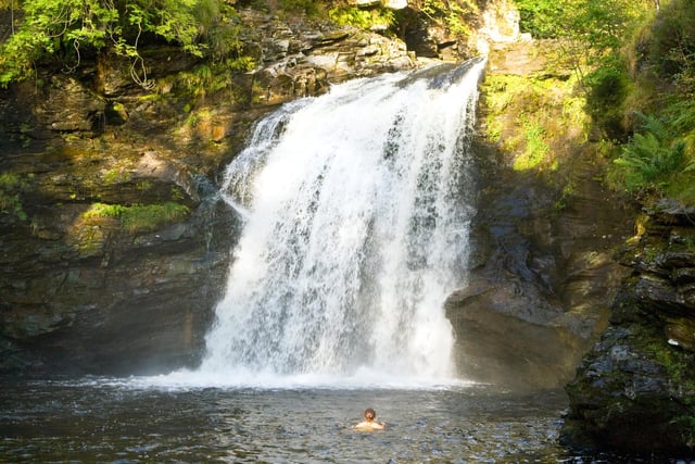 A  huge plunge pot under the Falls of Falloch offers a “spectacular great lido” known as Rob Roy’s Bathtub.