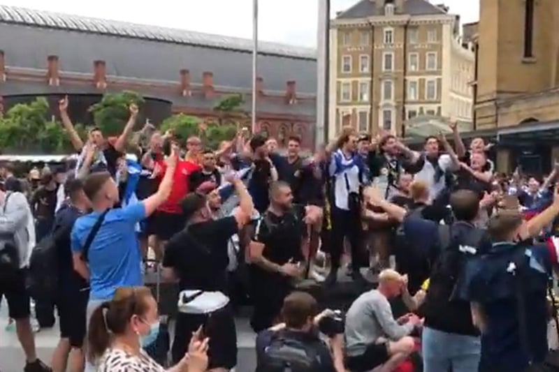 Yes Sir, I Can Boogie rings out from train stations across London as Scotland fans descend on the UK capital ahead of the game. The image is another screengrab from footage taken by Simon Lamrock of fans gathered outside King's Cross St Pancras station after their journey down from Scotland.