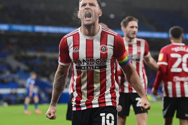 Sheffield United captain Billy Sharp celebrates his team's win over Cardiff City: Ashley Crowden / Sportimage