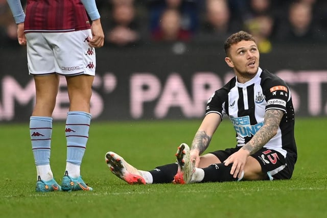 Newcastle full back Kieran Trippier sits down on the turf before leaving the field with an injury during the Premier League match between Newcastle United and Aston Villa at St. James Park on February 13, 2022 in Newcastle upon Tyne, England. (Photo by Stu Forster/Getty Images)