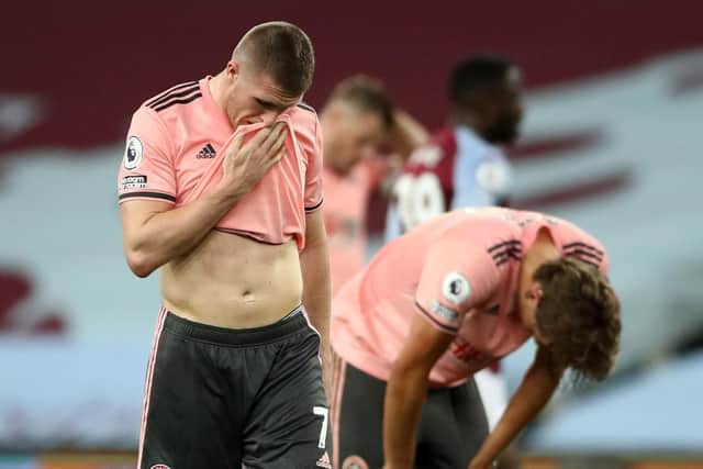 Sheffield United's John Lundstram looks dejected after the final whistle during the Premier League match at Villa Park, Birmingham. Tim Goode/NMC Pool/PA Wire.