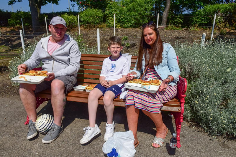 Enjoying their fish & chips in Marine Park, South Shields on Bank Holiday Monday, Kevin and Lisa Cleghorn and son Harry (8) of Newcastle.