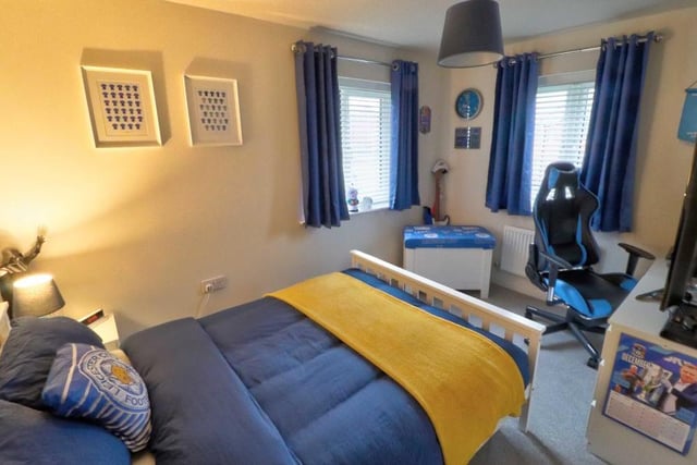 Full of colour, the second double bedroom at the Shirebrook property is a generous size. There are two uPVC double-glazed windows, plus a carpeted floor.