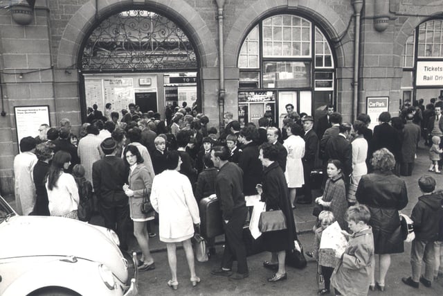 Holiday makers leave Sheffield Midland Station in May 1971.