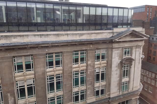 The glass extension on the top of Steel City House, West Street