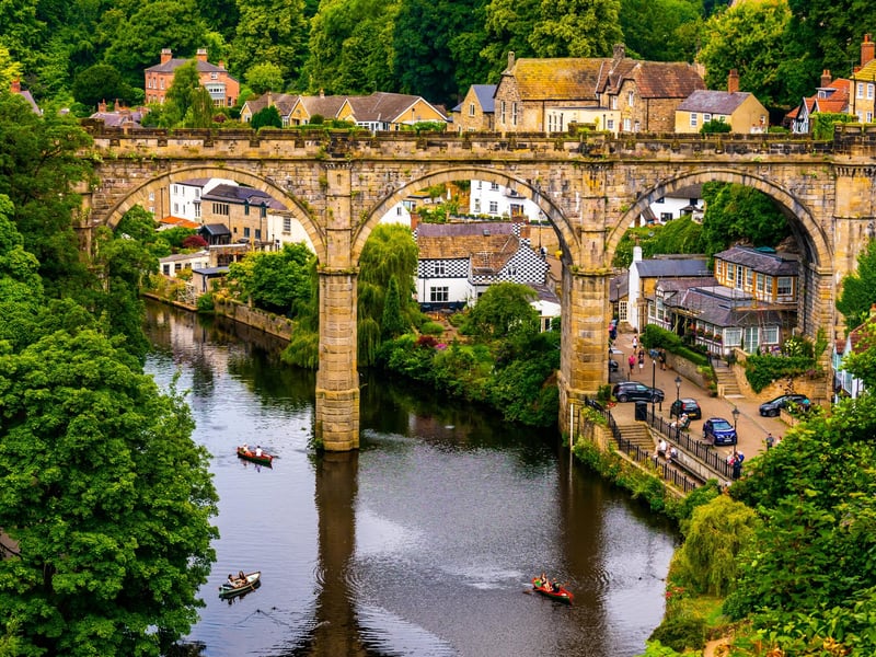Knaresborough is characterized by its medieval streets and stone staircases that wind their way up and down toward the River Nidd, with its impressive railway viaduct overhead. The town centre boasts charming restaurants and shops, and a visit to Mother Shipton's Cave is highly recommended.