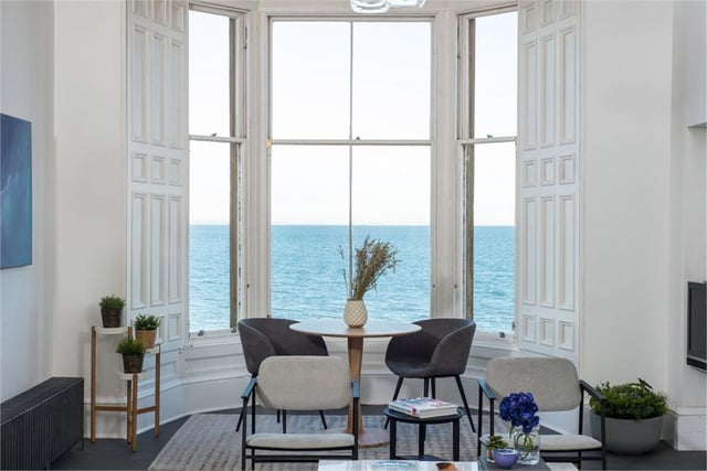 The living room has uninterrupted views of the Forth.