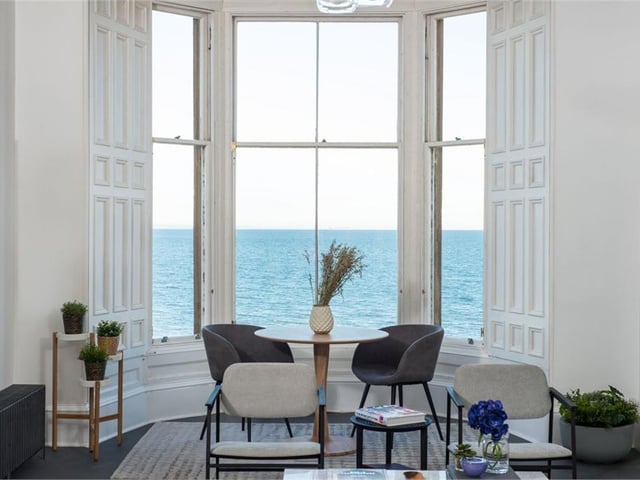 The living room has uninterrupted views of the Forth.
