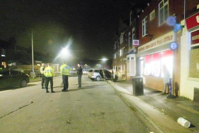 Police on Market Street in Highfields, Doncaster, after a car ended up in the front of a property (photo by Vitalijus Zidko)