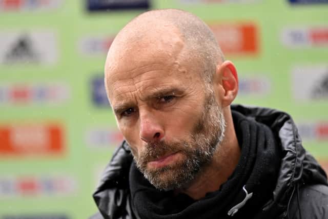 An emotional Paul Warne spoke of his disappointment in Sheffield Wednesday's relegation.