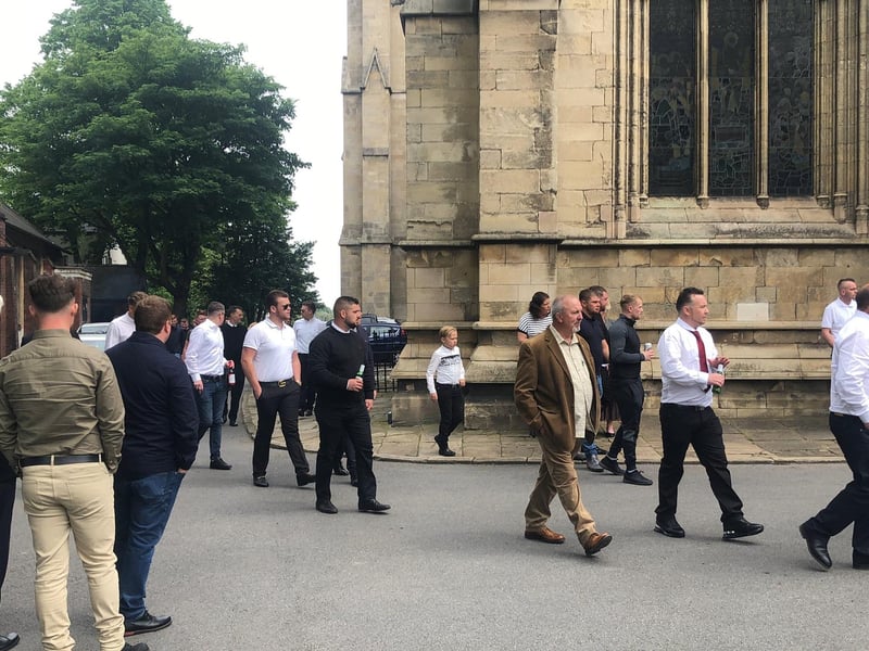 Many people followed the hearse on foot