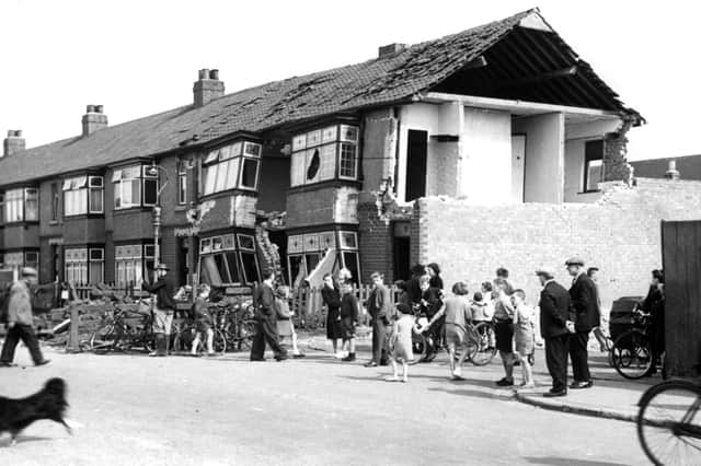 The damage from a German air raid is clear to see in this view of Brenda Road.