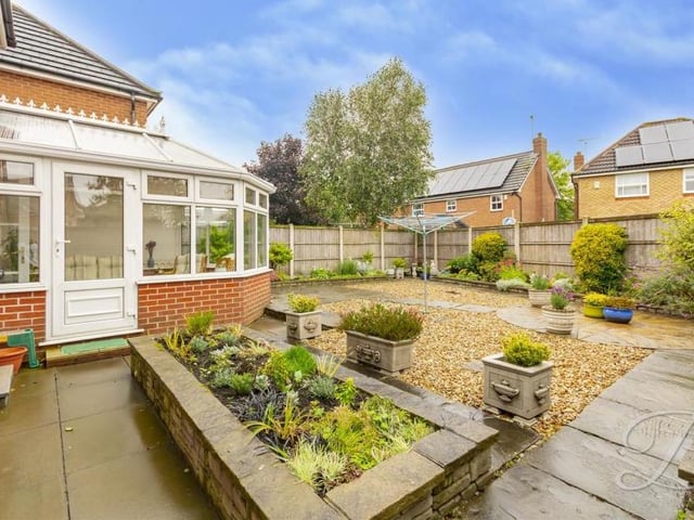 The back garden from another angle. Private and enclosed, it is an appealing space.