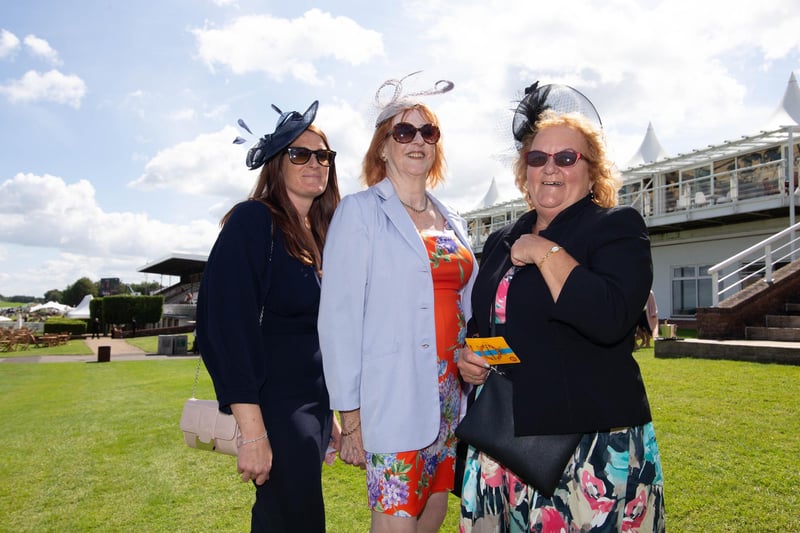 Ladies Day at Qatar Goodwood Festival, Goodwood on 29th July 2021
Pictured:  Becky Morris with her mother Valerie and Pamela King.
Picture: Habibur Rahman