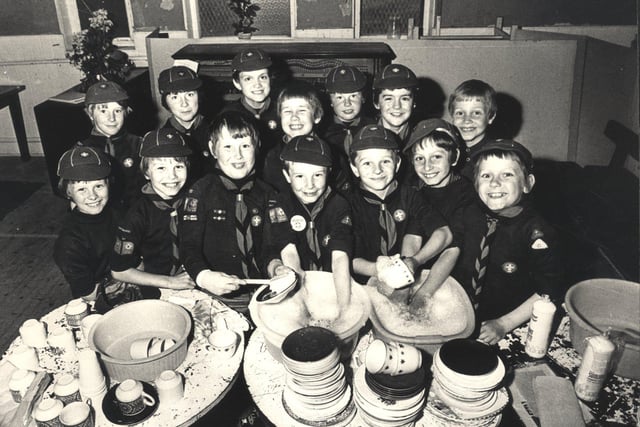 The 74th Sheffield (Heeley) Cub Scouts buckled down to a sponsored dish washing session at Heeley Parish Church Hall in 1979
