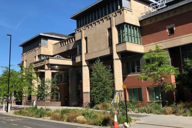 Sheffield Crown Court, pictured, has heard how a tearful South Yorkshire teenager tried to flee the court building after he was given a custodial sentence for intimidating witnesses.