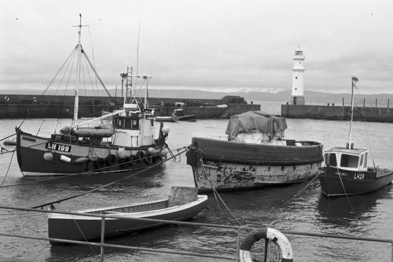 Fishing boats moored at Newhaven harbour, December 1988.