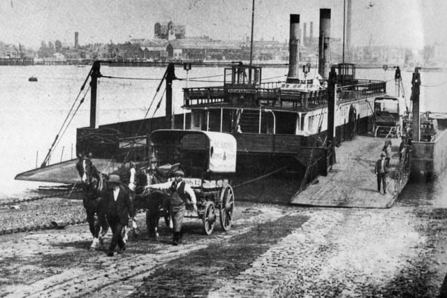 A horse-drawn cart disembarks from the floating bridge at Gosport in 1900