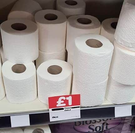 A picture taken inside the shop shows the rolls on sale at an inflated price.